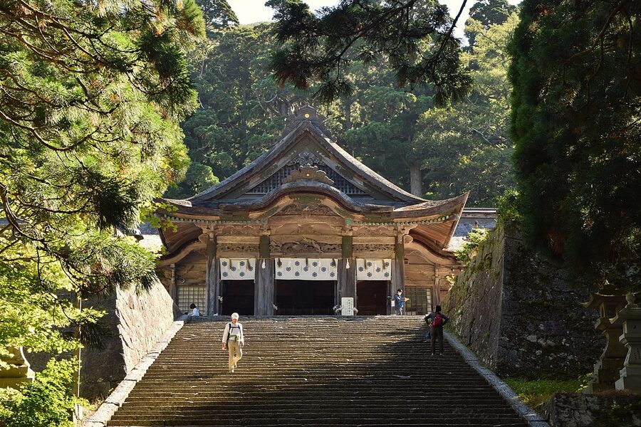 The approach path to Daisenji Temple with traditional Japanese wooden structures