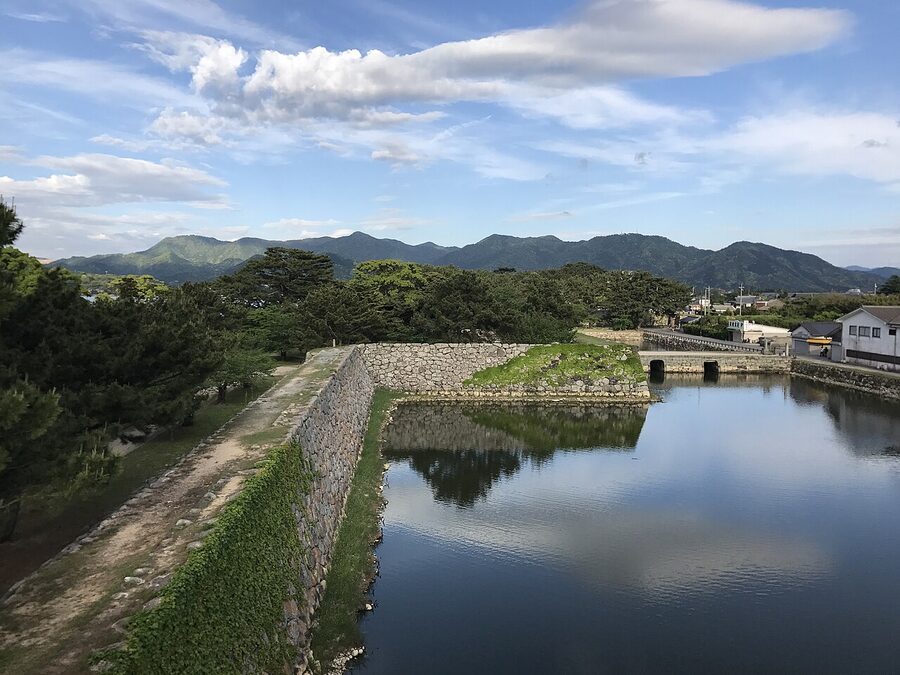 The Gokurakubashi bridge and moat at the base of the keep of Hagi Castle ruins