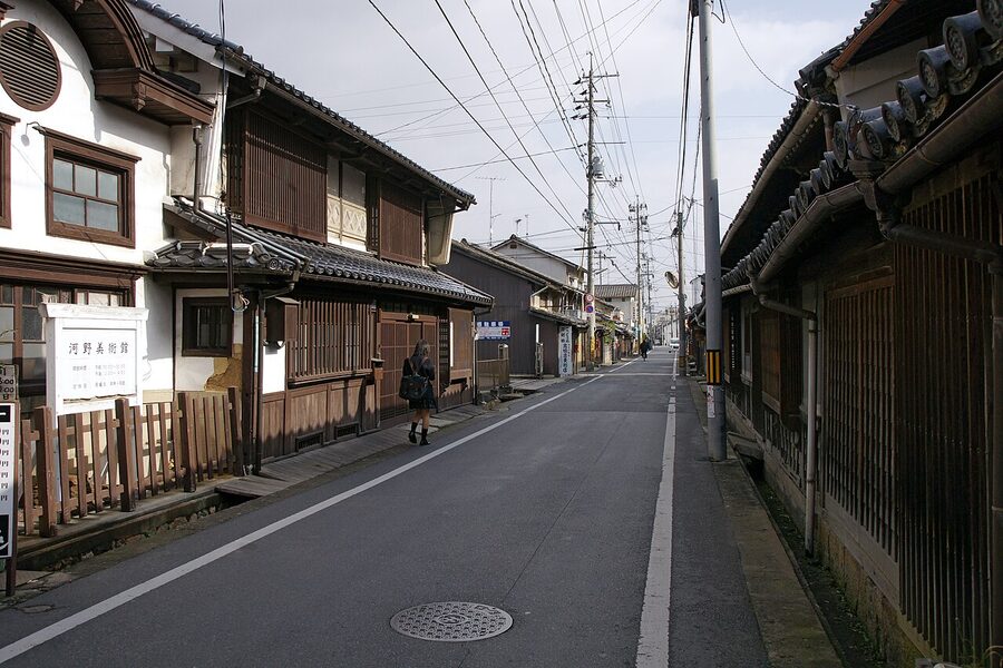 The preserved Joto merchant quarter of Tsuyama with low wooden buildings along a narrow street