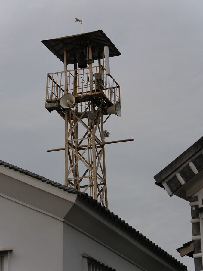 A wooden Edo-period fire watchtower in the Kurashiki Bikan quarter