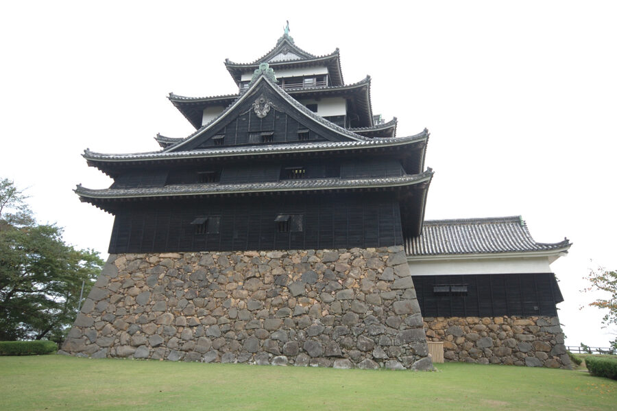 Close-up of Matsue Castle showing its black-lacquered timber exterior