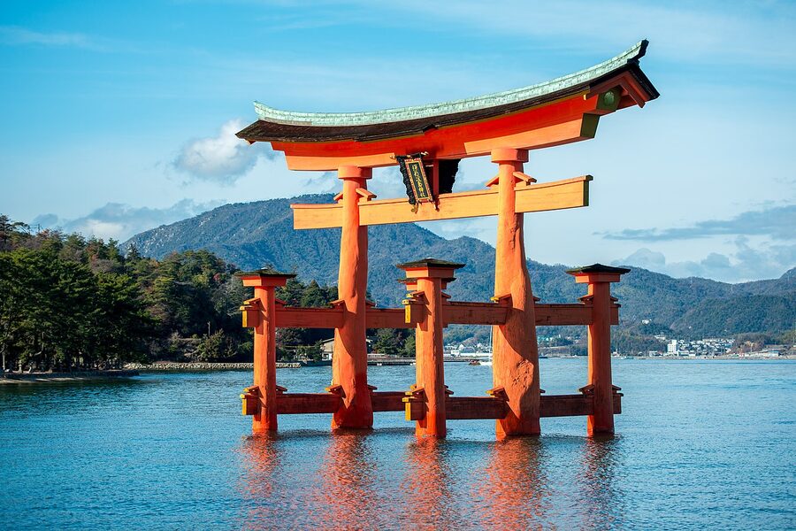 The floating torii gate at Itsukushima at high tide standing in the bay