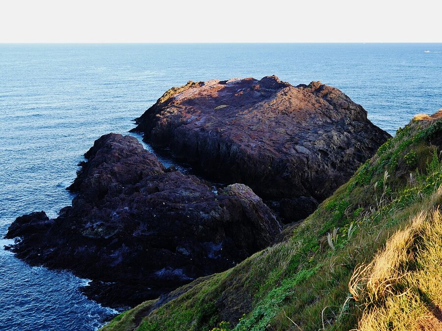 The rocky coast at Motonosumi Inari Shrine with cliffs dropping to the Sea of Japan