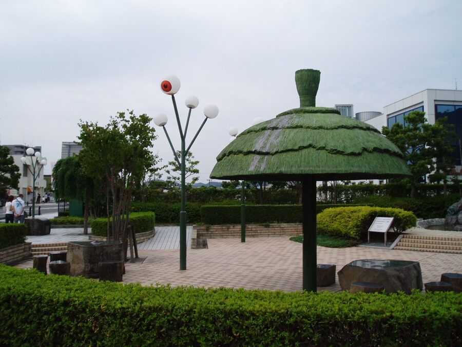 Details of the Mizuki Shigeru yokai bronze statues along the street