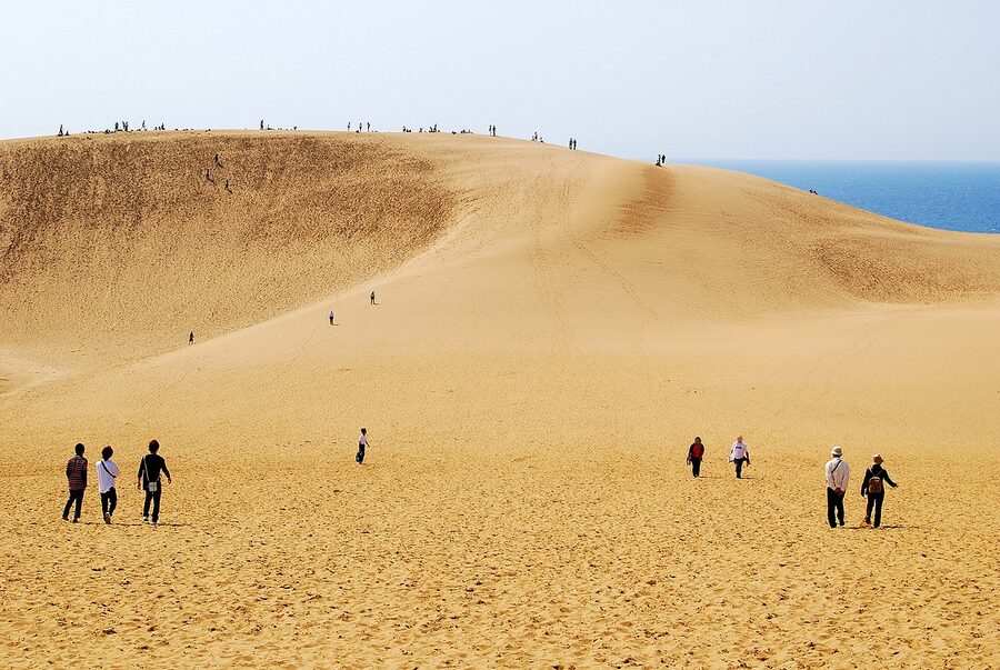 Wide panorama of the Tottori Sand Dunes with the Sea of Japan on the horizon
