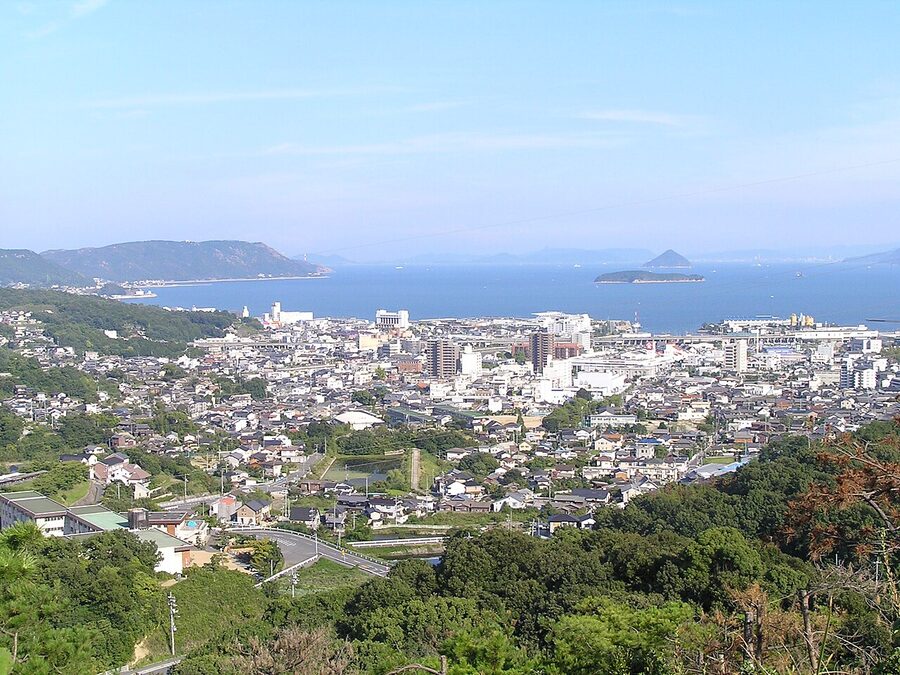 View from Mount Washu over Kojima town and the Seto Inland Sea with the Seto Ohashi Bridge