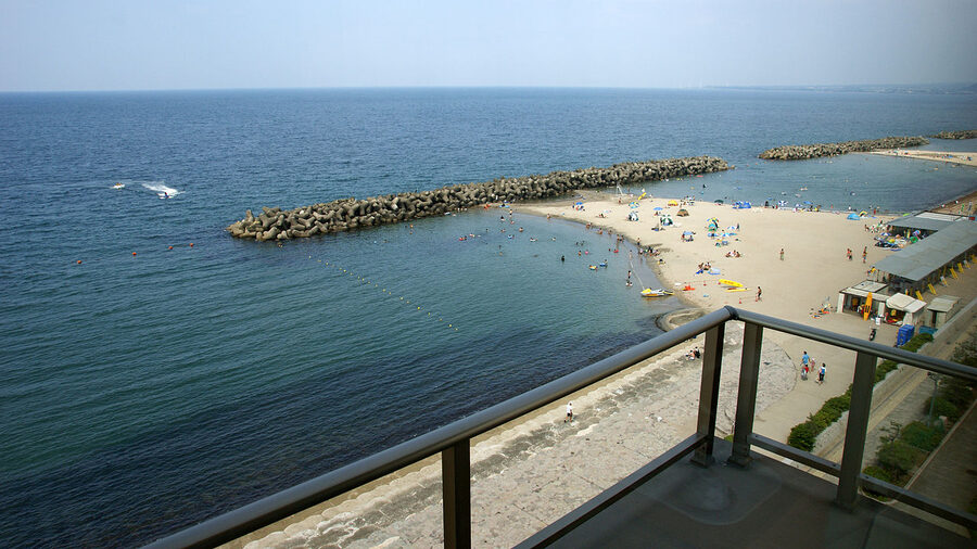 The coast at Kaike Onsen with Mt Daisen visible on the horizon