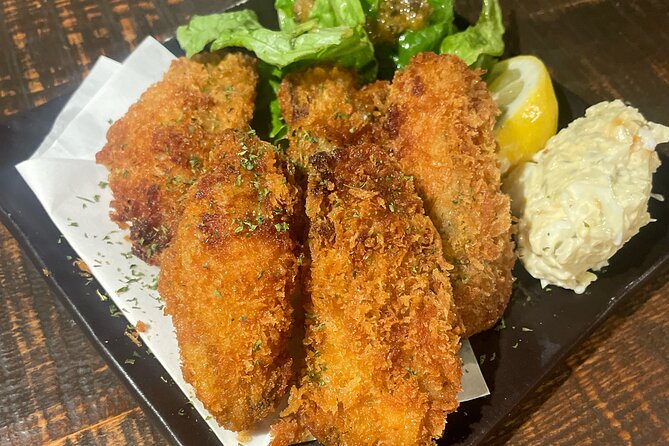 Foodie Bike Tour in Hiroshima Taste Local Delights - A thoughtful stop at the Atomic Bomb Dome