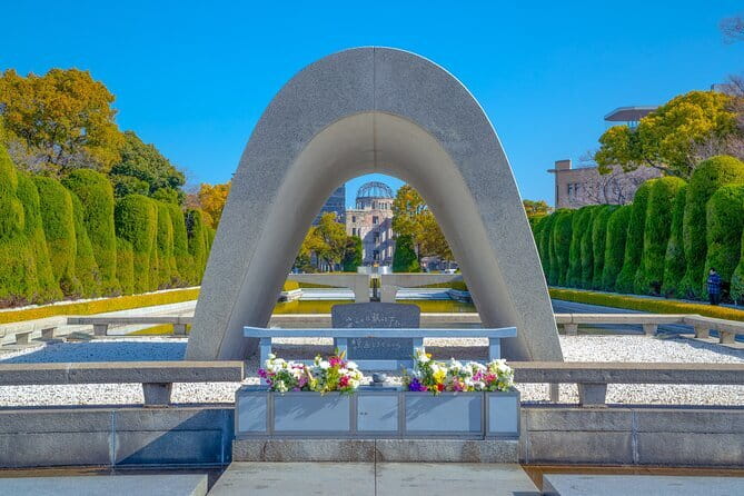 Half Day Peace Park & Bomb dome Private Tour - Reading the Atomic Bomb Dome from the riverbank