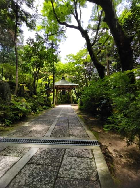 Hiroshima: Peace Park, Castle, and Mitaki Temple E-Bike Tour - Riverside cycling toward Hiroshima Castle
