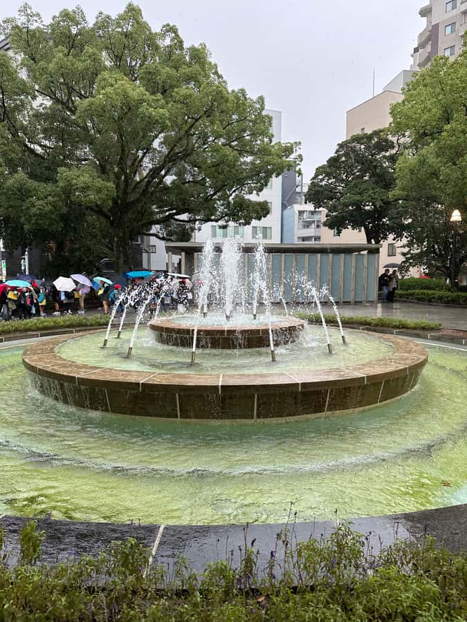 Hiroshima: Private City Highlights Walking Tour - The Atomic Bomb Dome and the city beyond it