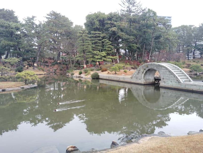 Hiroshima: Shukkei-en Garden with local guide 90min - The curved stone bridge, boat landing, and moon-viewing stage
