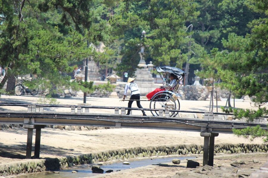 Miyajima: Private Rickshaw Tour to Itsukushima Shrine - Meeting your guide outside the Miyajima Ferry Terminal