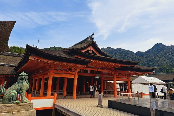 Miyajima UNESCO World Heritage Site Private Tour - Entering Itsukushima Shrine and watching the water