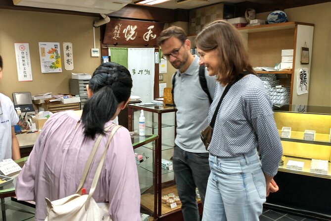 Private Hiroshima Matcha & Wagashi Experience Tour - Whisking your own matcha at a table