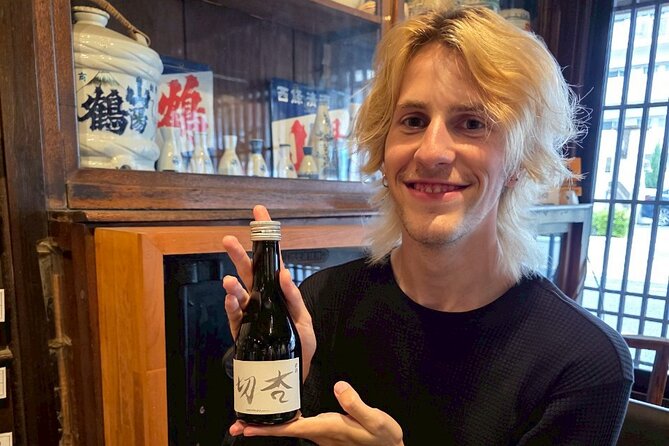 Visit behind the Scenes: Hiroshima Saijo Sake Brewery Tour - Sanyotsuru’s spring water and calligraphy